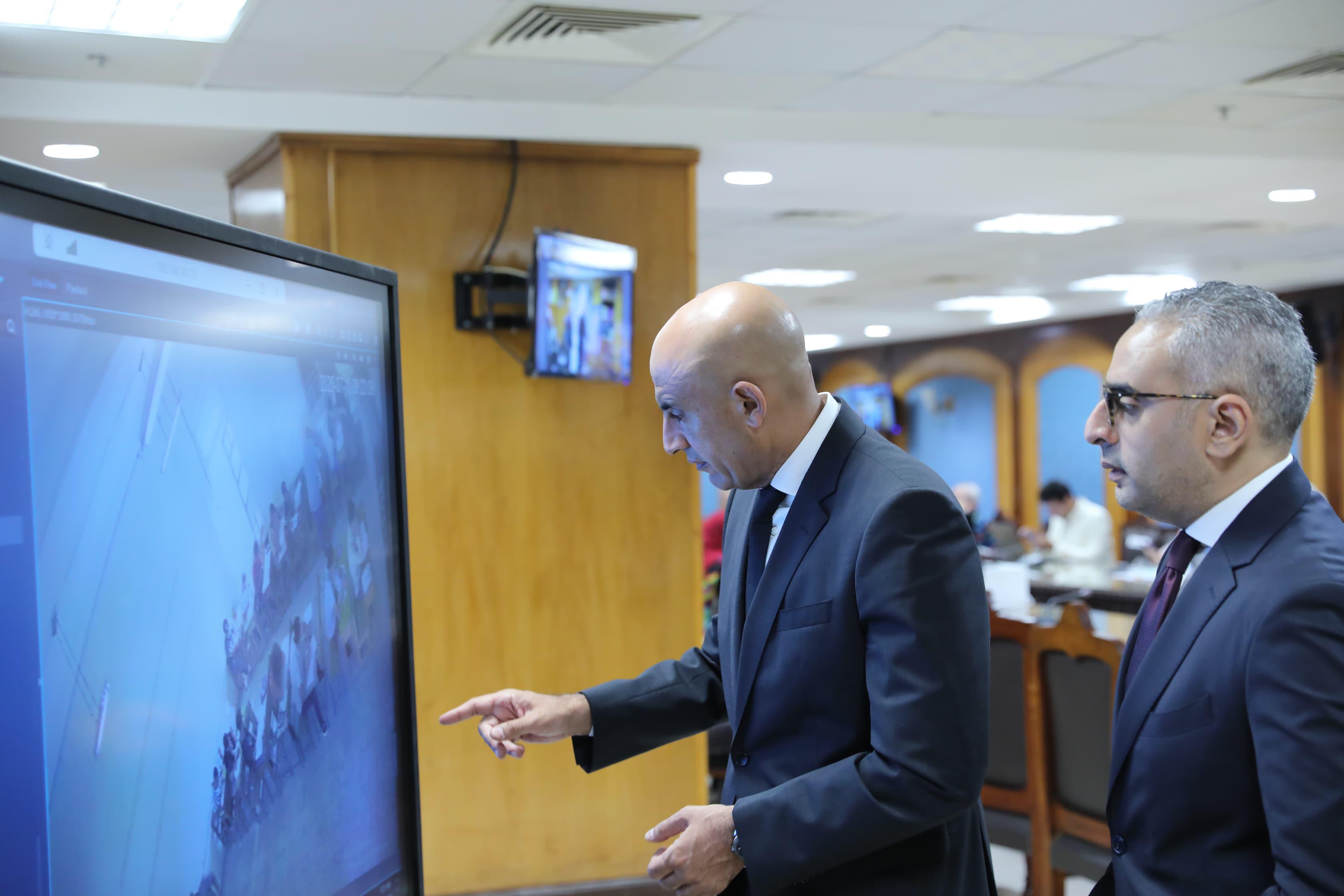 The Ministry of Education reviews the Operations Room's report on the progress of the final days